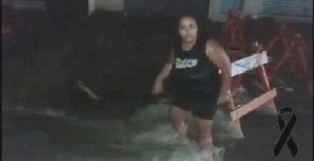 chuva-mulher-engolida_por_cratera